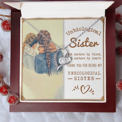 Havijo Best Friends Forever Love Necklace showing two intertwined heart pendants on a delicate chain
