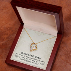 Havijo Unbiological Sister Forever Love Necklace featuring a delicate silver chain and heart-shaped pendant with engraved design