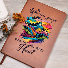 Havijo "Go With All Your Heart" journal, a leather-accessory with embossed cover, open to show lined pages and elegant design.