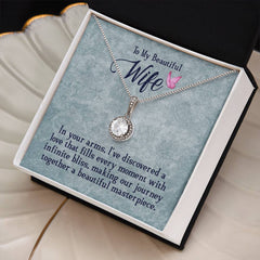 Havijo "In My Wife's Arms" Eternal Hope Necklace, close-up of silver jewelry with engraved heartfelt message and delicate chain.