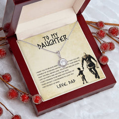 Havijo Aim For The Skies Eternal Hope Necklace with a delicate pendant hanging on a fine chain, close-up view.