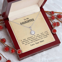 Havijo Eternal Hope Necklace featuring a sleek silver chain and a pendant with the phrase "Straighten Your Crown" in elegant style.