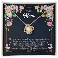 Havijo Forever Grateful Love Knot Necklace jewelry with a delicate intertwined heart-shaped design on a silver chain.