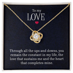 Havijo Love Knot Necklace with intricate design, showcasing a delicate jewelry piece symbolizing love and connection.