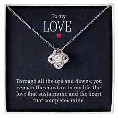 Havijo Love Knot Necklace for women, elegant jewelry with intertwined heart-shaped design, showcasing intricate craftsmanship.
