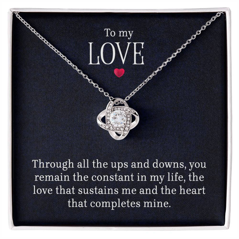 Havijo Love Knot Necklace for women, elegant jewelry with intertwined heart-shaped design, showcasing intricate craftsmanship.