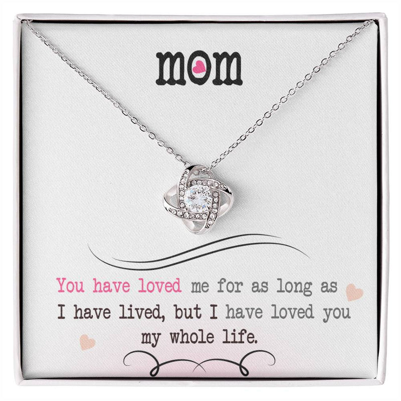 Havijo Love Knot Necklace featuring a delicate intertwined design on a silver chain, showcasing elegant jewelry craftsmanship.