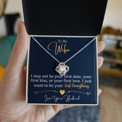 Havijo Love Knot Necklace with intricate design, featuring a delicate silver jewelry piece symbolizing eternal love.