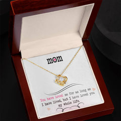 Havijo Love Knot Necklace jewelry with a sleek, intertwined design, perfect for expressing love and connection.