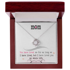Havijo Love Knot Necklace featuring a delicate intertwined design in silver, perfect as meaningful jewelry gift.