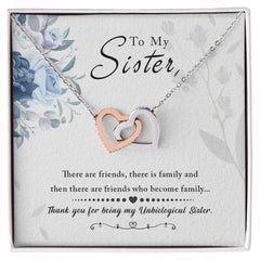 Havijo To My Sister interlocking hearts necklace featuring silver jewelry with two heart pendants symbolizing love and connection.