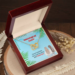 Havijo Best Friends interlocking hearts necklace in jewelry, featuring two connected heart pendants on a delicate chain.