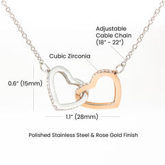 Havijo interlocking hearts necklace featuring two silver heart pendants on a delicate chain, elegant jewelry accessory.