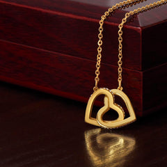 Havijo Interlocking Hearts Necklace with silver-tone chain and two connected heart pendants, elegant jewelry for women.