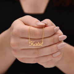 Havijo classic style name necklace with a personalized metal pendant on a delicate chain, jewelry accessory for everyday wear