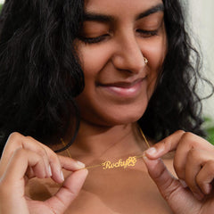 Havijo classic paw print name necklace with personalized engraved pendant on silver chain, jewelry accessory for pet lovers.