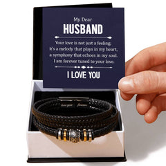 Havijo leather bracelet with engraved "Your Love is not Just a Feeling" message, stylish jewelry accessory on a leather band.