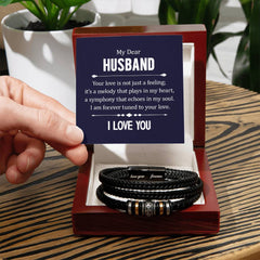 Havijo leather bracelet with engraved "Your Love is not Just a Feeling" message, stylish jewelry accessory for men and women.