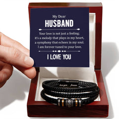 Havijo leather bracelet with engraved "Your Love is not Just a Feeling" message, stylish jewelry accessory.