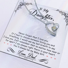Havijo My Baby Girl Forever Love Necklace displayed with a delicate silver chain and heart-shaped pendant.
