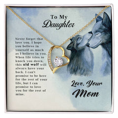 Old Wolf Forever Love Necklace by Havijo, close-up of silver jewelry featuring a heart and wolf motif on a delicate chain.