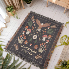 Havijo Adventure Awaits woven blanket with colorful patterns and soft fabric, perfect for cozying up on a couch or bed.