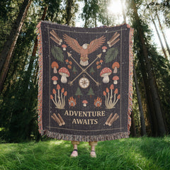 Havijo Adventure Awaits woven blanket with colorful, intricate patterns draped over a cozy sofa for a warm, inviting look.